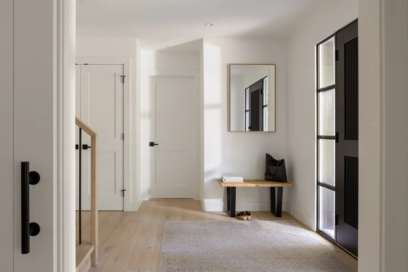 Custom home interior entryway by Venture Pacific in Crescent Beach